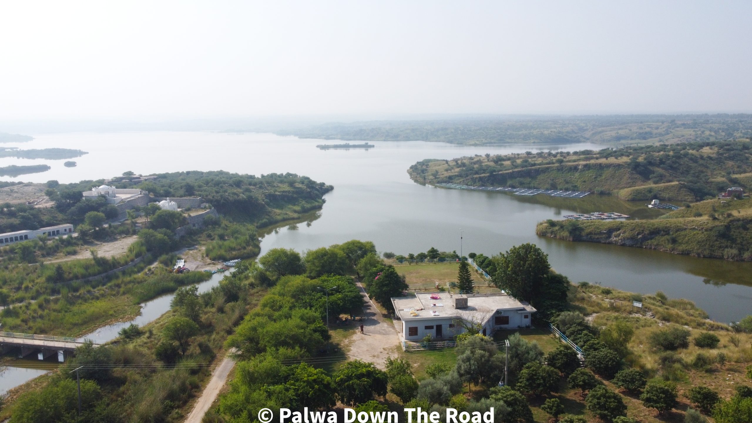 dharabi lake chakwal drone view, palwa down the road